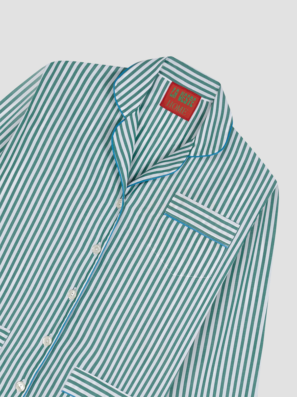 Two-piece pyjama made in cotton with blue striped print.