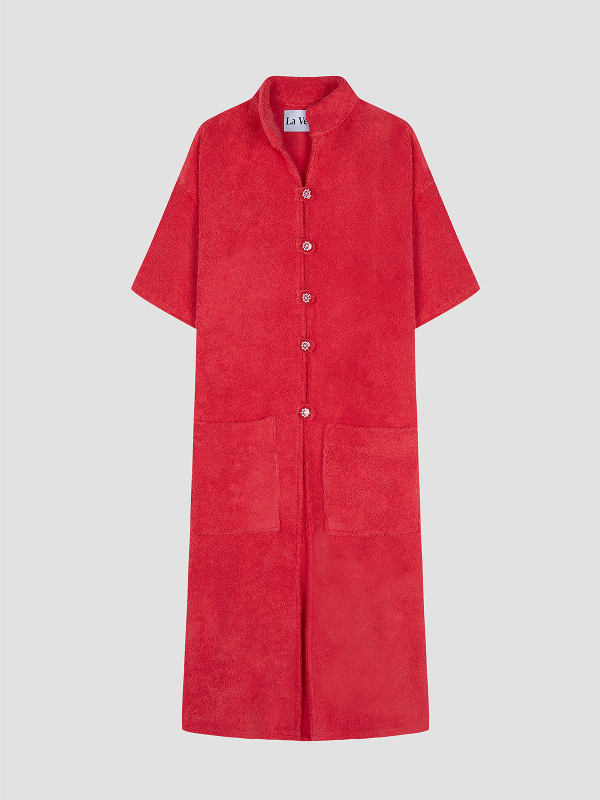 Red towel long kimono with two front pockets. Opened sides closed by detailed buttons. Handmade in Spain.