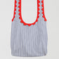Anchor Blue Handbag is a blue striped handbag with matching red corrugated details.