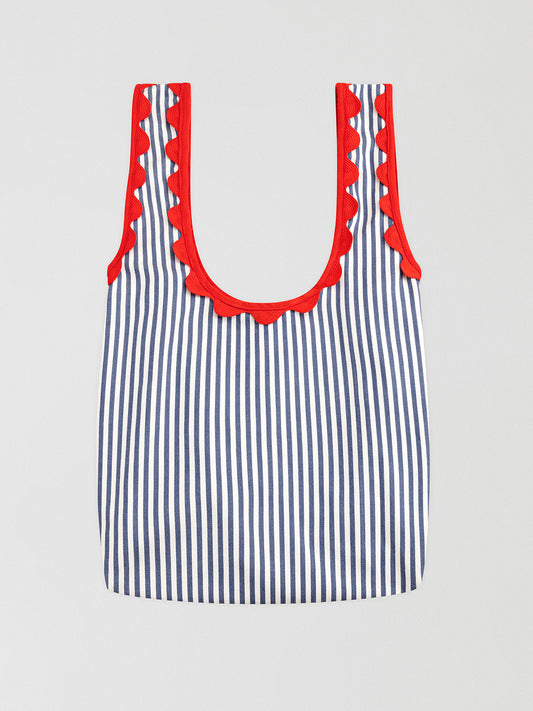 Anchor Blue Handbag is a blue striped handbag with matching red corrugated details.