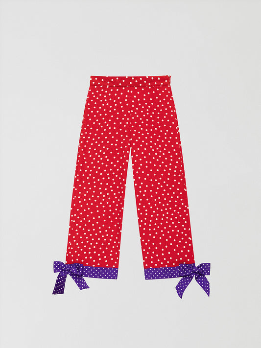 Red trousers printed with white polka dots and blue bottom.