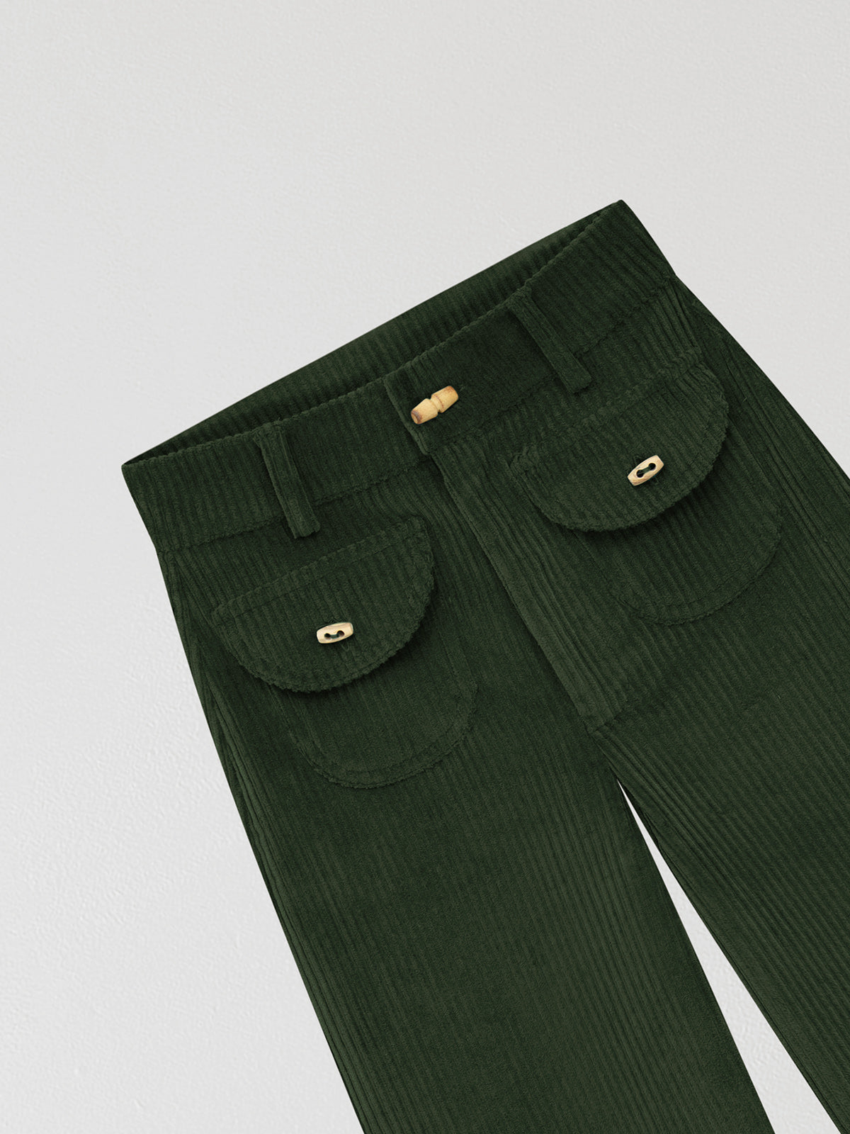 Dark green high waisted corduroy trousers.