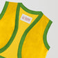 Yellow suede waistcoat with green wool ribbon