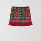 Highlands Skirt Check Red is a mini plaid skirt with red fringe at the hem. 