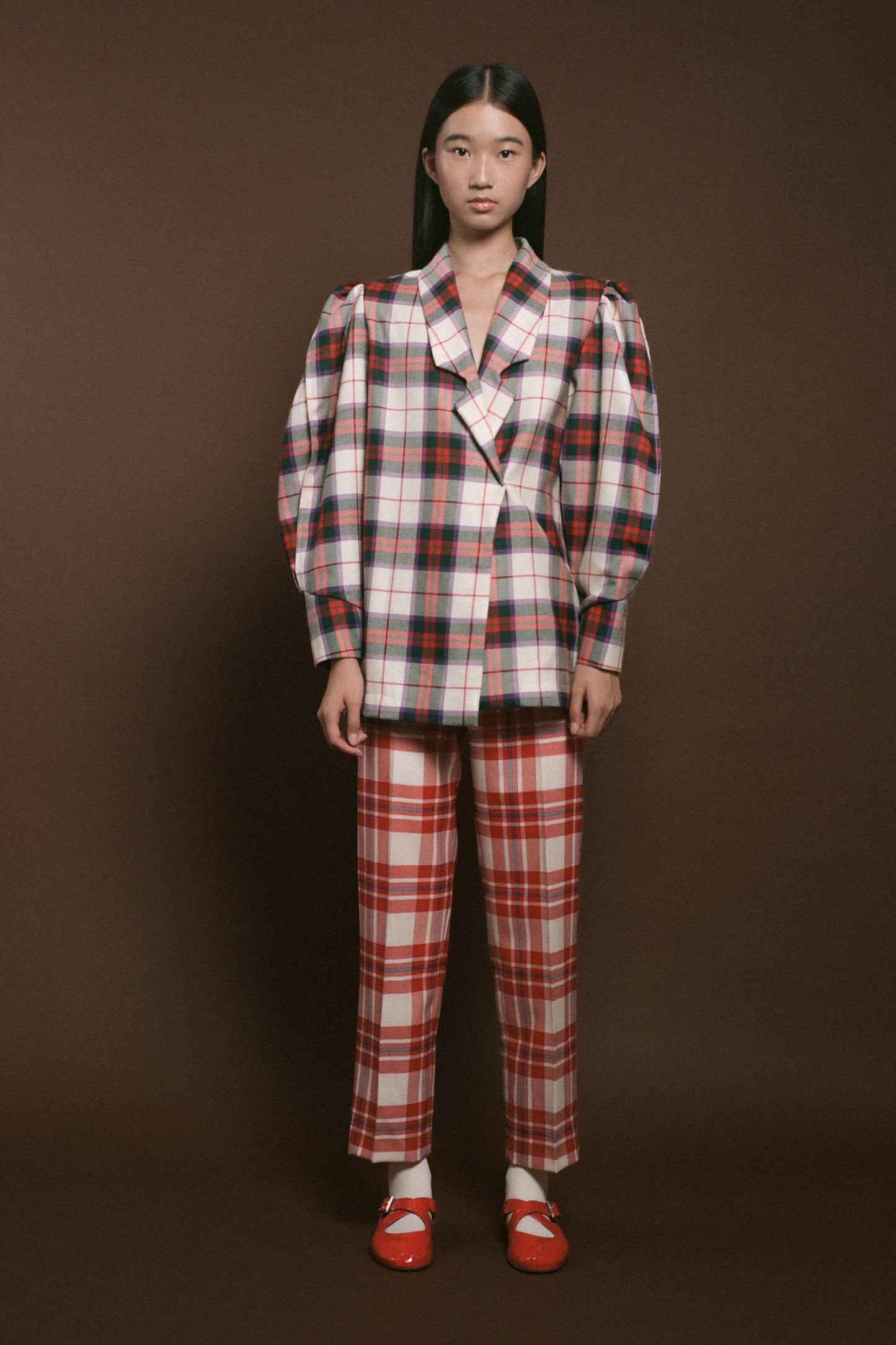 Checked trousers in red and ecru wool.