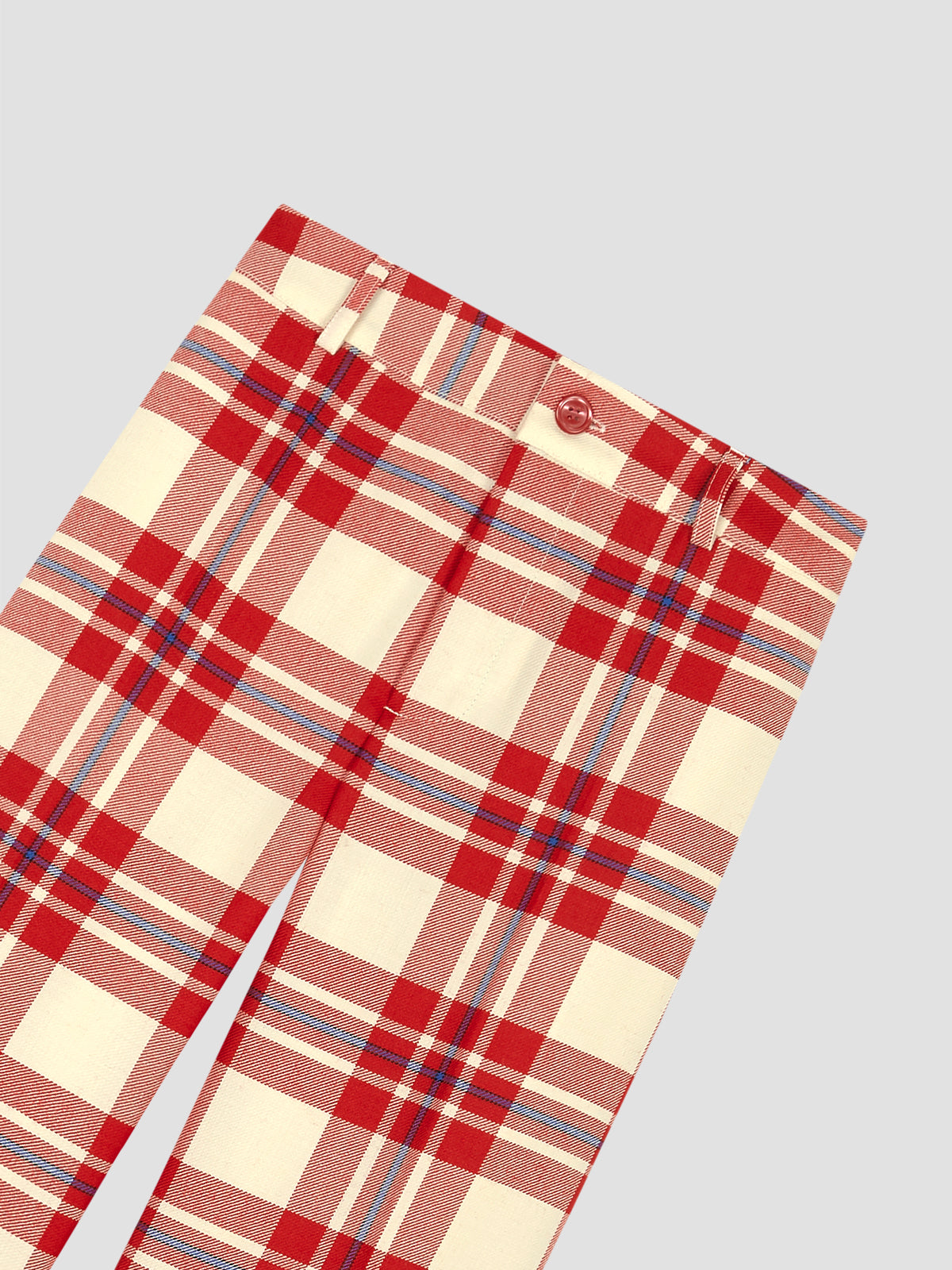 Checked trousers in red and ecru wool.