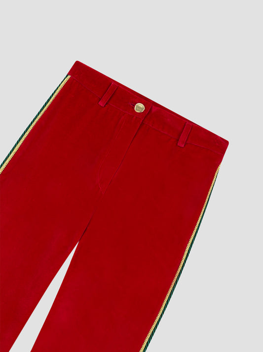 Red velvet pants with green and gold trimming