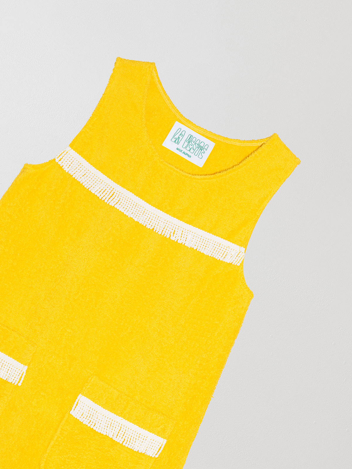 Short towel fabric dress with round neckline and front pockets