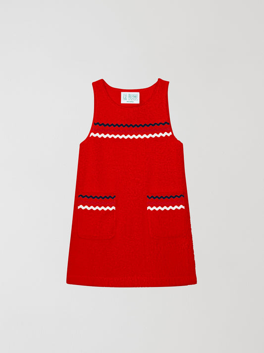 Mini Towel Red is a short sleeveless dress with blue, white and pink trim on the chest area and pockets.