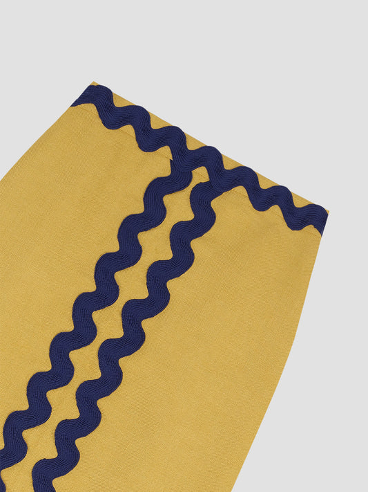 Midi skirt made in yellow linen with navy trim detail