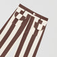Brown high-waisted trousers printed in cotton with brown and ecru stripes.