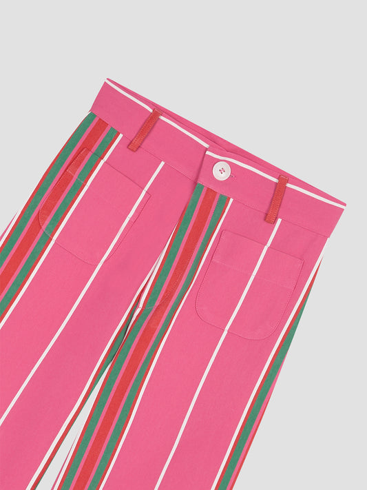 Fuchsia high-waisted printed trousers in cotton with red and green stripes.