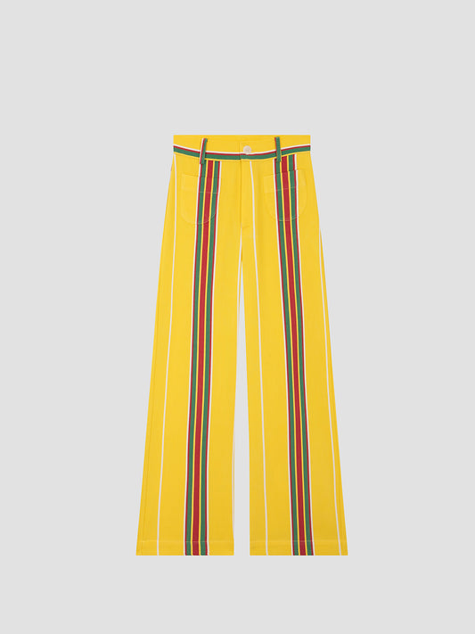 Yellow high-waisted printed trousers in cotton with red and green stripes. 