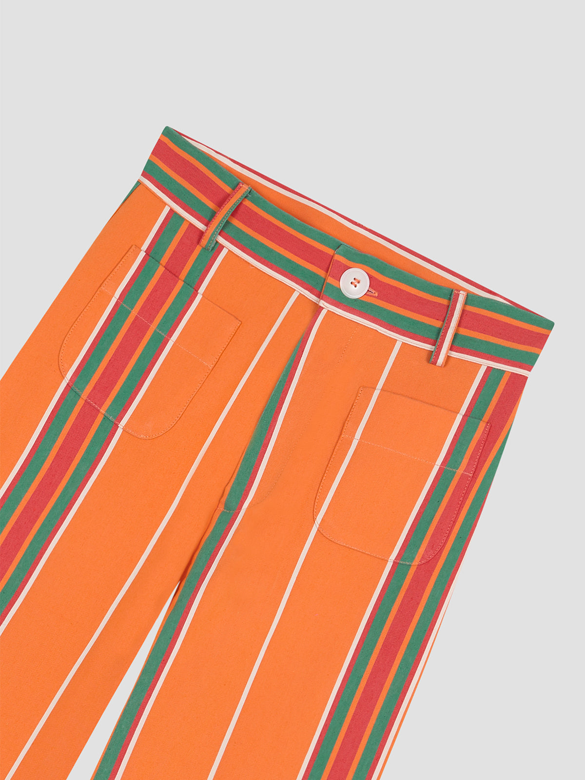 Orange high-waisted printed trousers in cotton with red and green stripes.