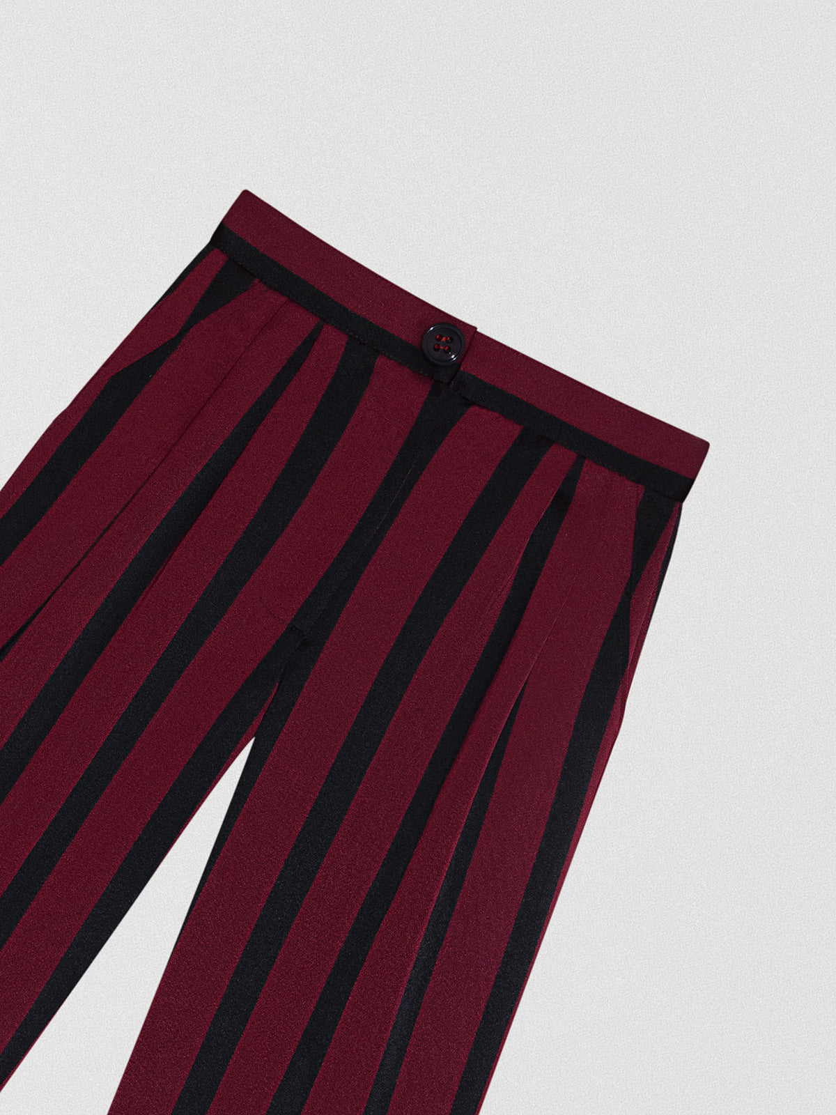 Burgundy and black striped suit trousers.