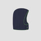 Puffa Hooded Blue is a navy blue quilted hood with green accents.