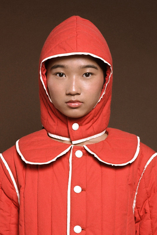 Model wearing the Puffa Hooded Red by La Veste