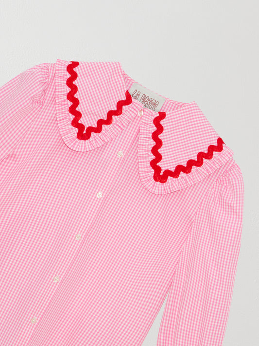 Pink and white vichy check shirt made of cotton with red trim detail on the collar