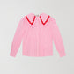 Pink and white vichy check shirt made of cotton with red trim detail on the collar