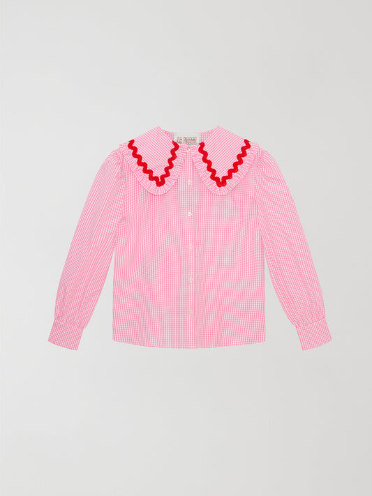 Pink and white vichy check shirt made of cotton with red trim detail on the collar