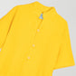 Yellow kimono with short sleeves and button closure with rudder buttons