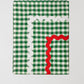 Rectangular tablecloth made of&nbsp;green and white vichy check cotton with&nbsp;white and red trim