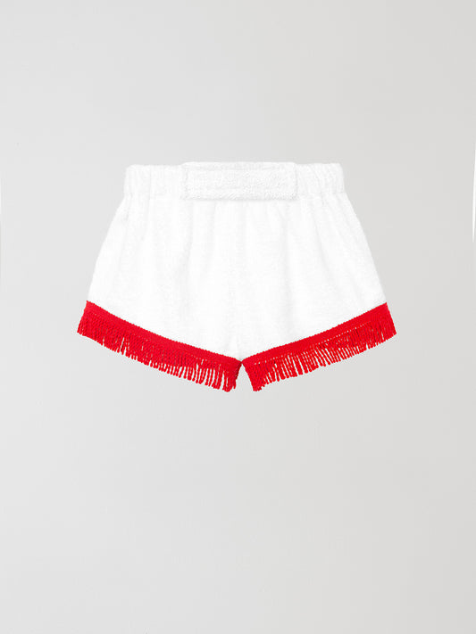 Towel shorts made in white cotton with red fringes.