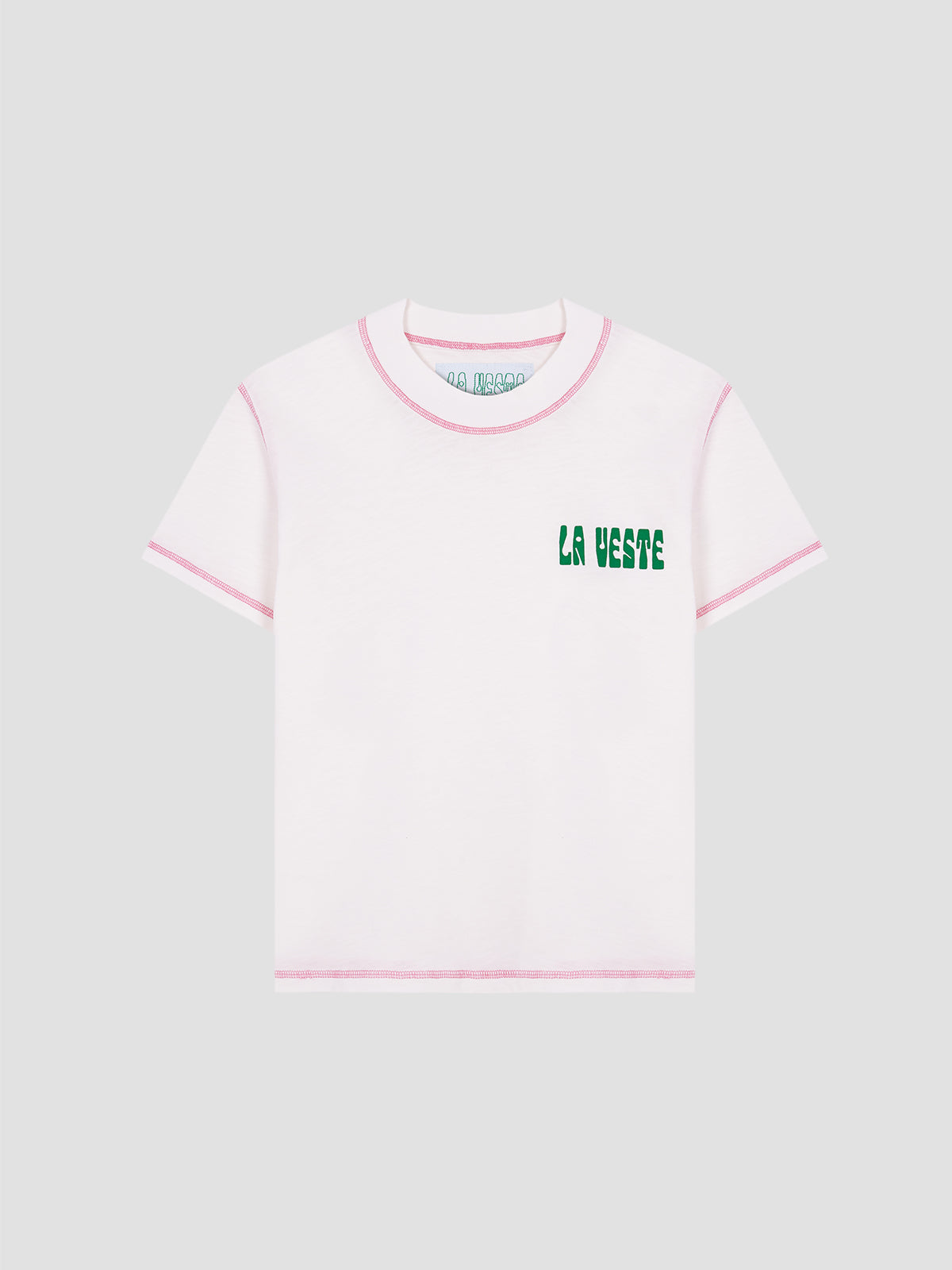 Color: White/Pink.  White cotton T-shirt with LA VESTE logo in green.  Regular fit. Normal length. Round neck. Short sleeves. Collar and sleeve cuffs in pink contrast. Anagram on the chest in green.