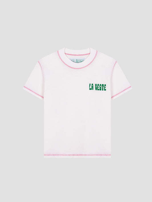 Color: White/Pink.  White cotton T-shirt with LA VESTE logo in green.  Regular fit. Normal length. Round neck. Short sleeves. Collar and sleeve cuffs in pink contrast. Anagram on the chest in green.