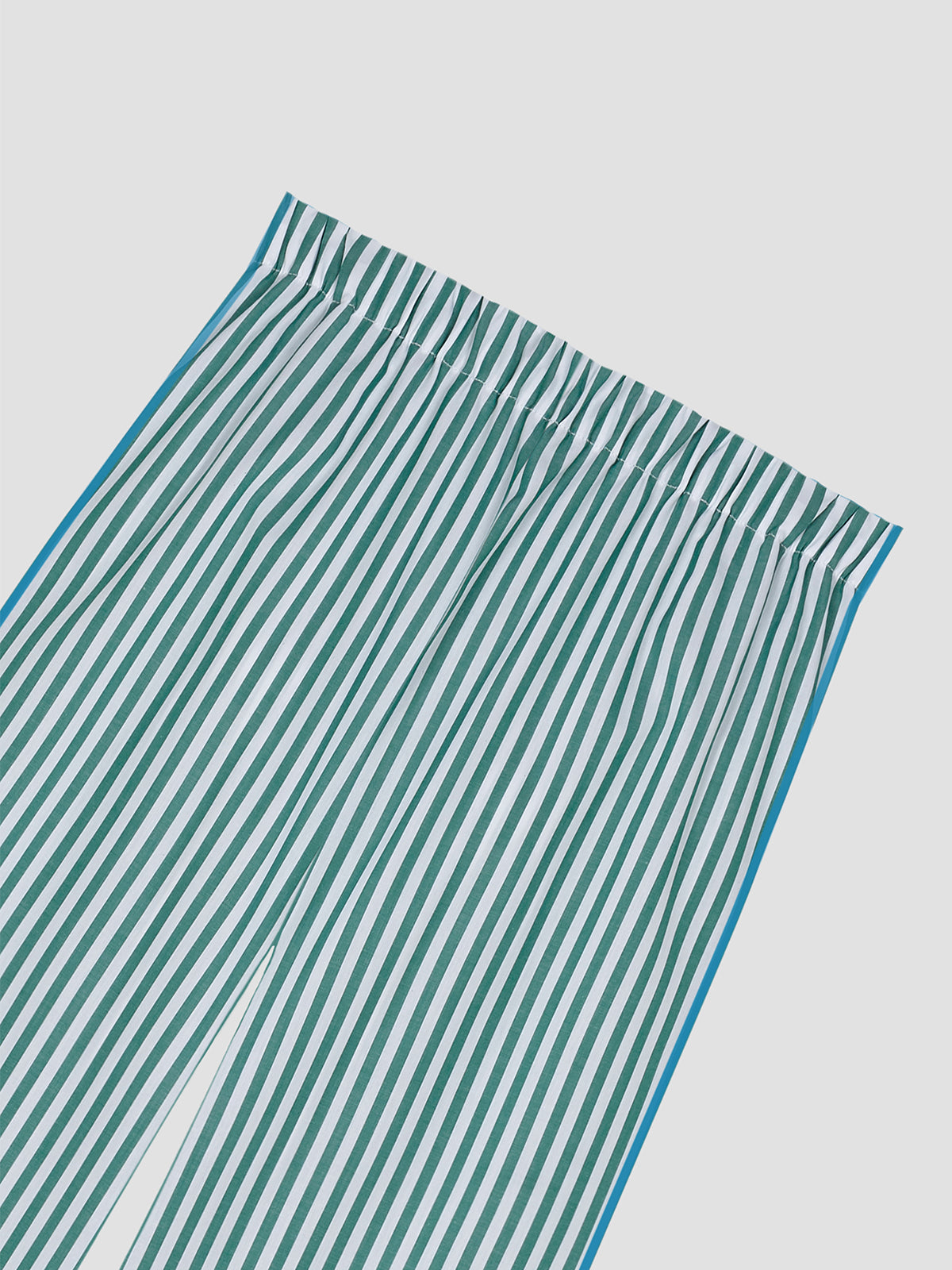 Two-piece pyjama made in cotton with blue striped print.