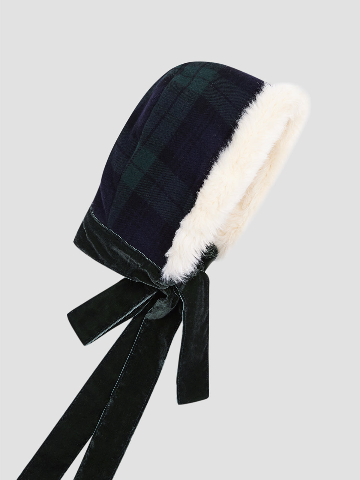 Women's plaid hood with ecru fur lining.