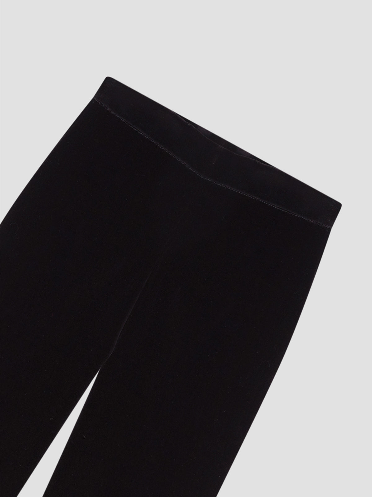 Women's black velvet straight pants with invisible zipper closure.