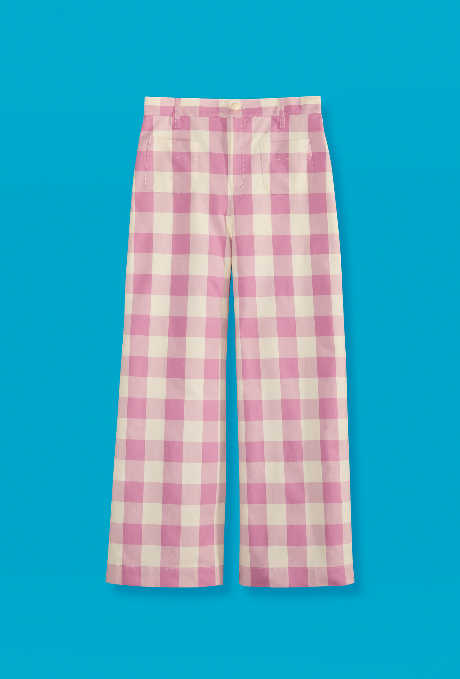High rise pants with pink and white checks exposed on a blue background