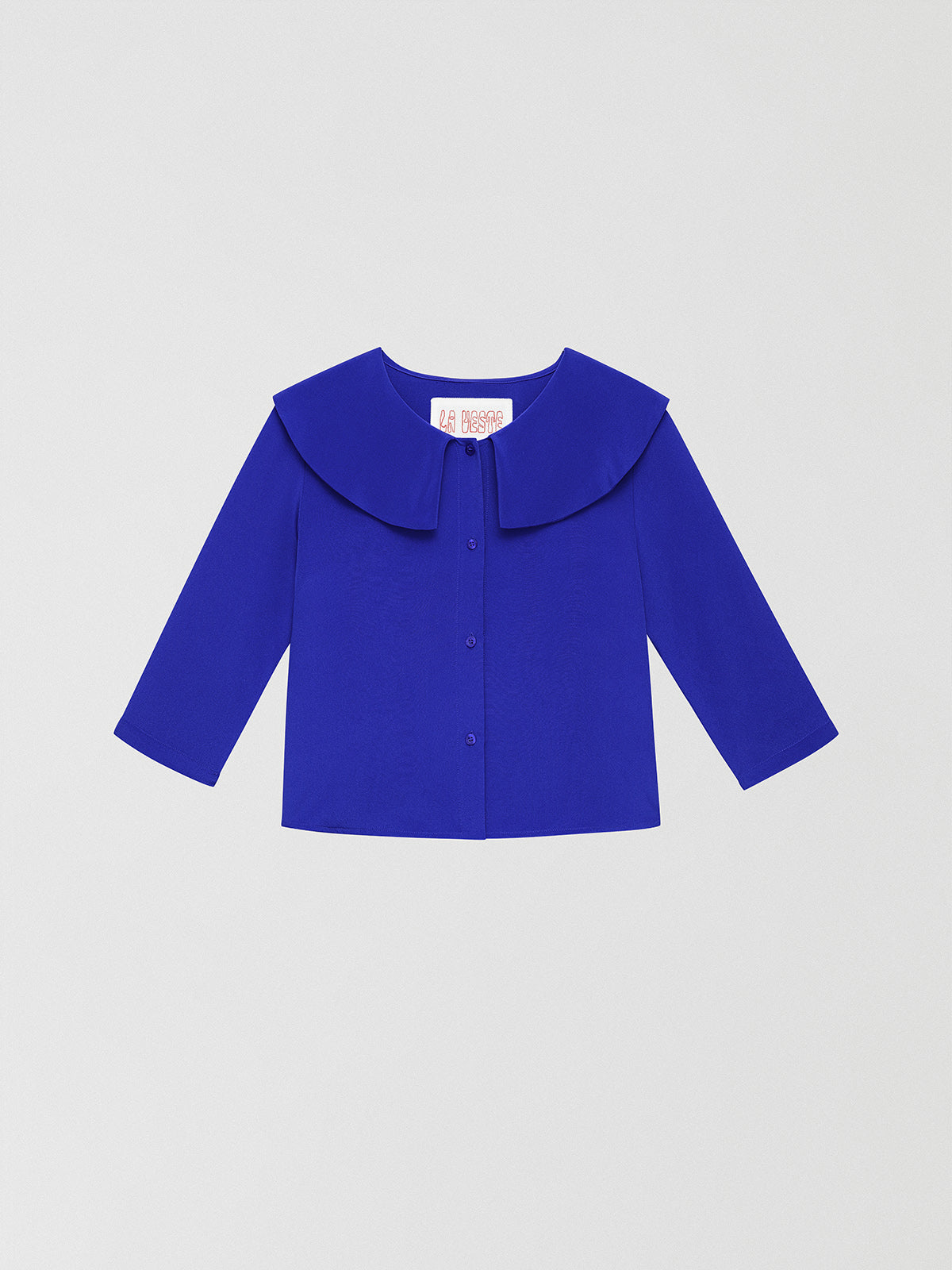 Silk Shirt Marine is a dark blue silk shirt for women with V-neckline and pleated front in the same color.