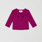  Silk Shirt Bordeaux is a raspberry color shirt with V-neckline and pleated front and sleeves.