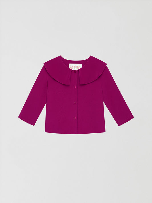  Silk Shirt Bordeaux is a raspberry color shirt with V-neckline and pleated front and sleeves.