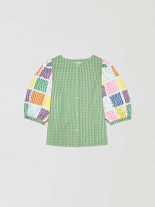 Cotton shirt with green and white vichy squares print and patchwork puffed sleeves.