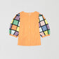 Cotton shirt with orange and white vichy squares print and patchwork puffed sleeves