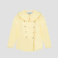 Augusta Shirt Yellow is a long sleeve yellow shirt with brown piping detail and brown buttons.