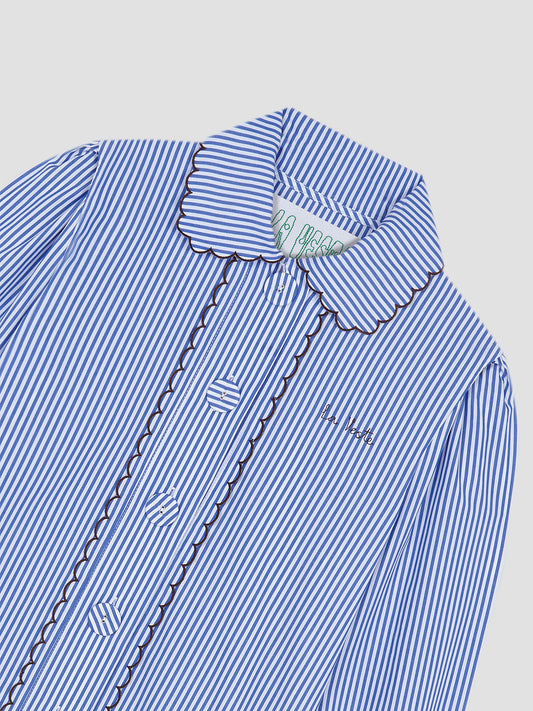 Long sleeve blue striped shirt with buttons lined with the same design as the shirt.