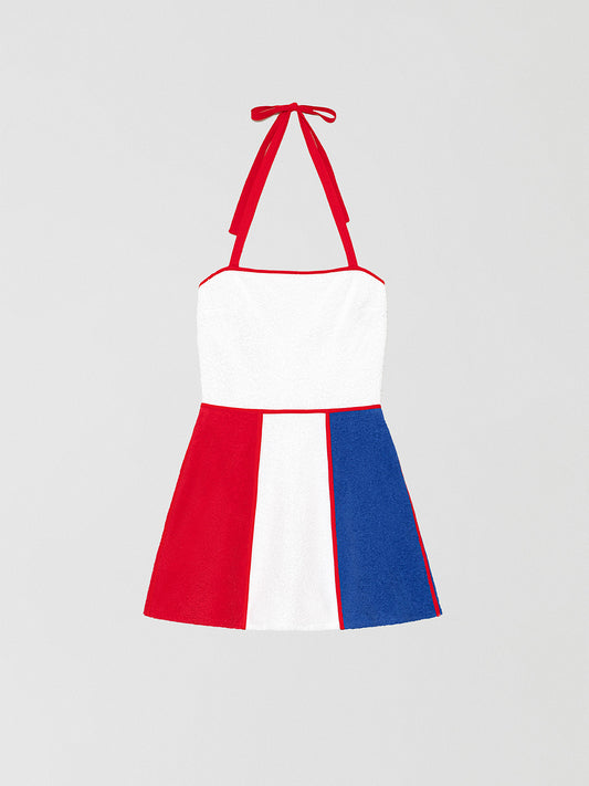 Colour: Red/White/Navy.   Short towel dress made in white, red and navy cotton.   Regular fit. Short length. Flared skirt with red, white and navy stripe. Square neckline with knotted bow at the neck.  