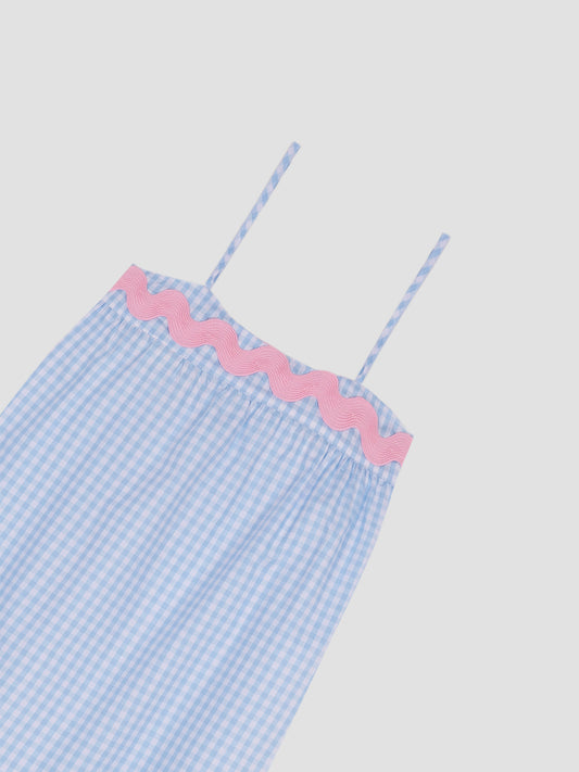 Loose midi style nightgown with blue plaid print and pink trim on the square neckline