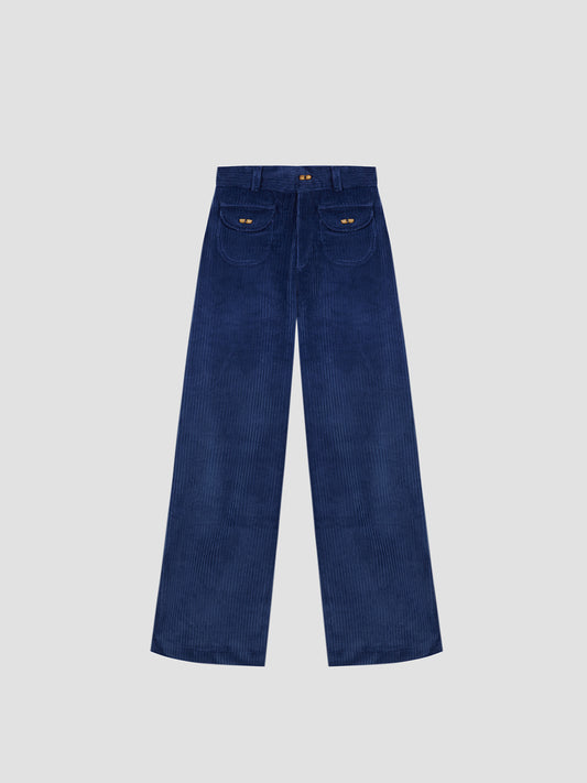 Clovis Pants Blue is a high-waisted dark blue trouser with wooden buttons on the front pockets.
