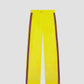 Yellow velvet trousers with aubergine wool ribbon detail. 