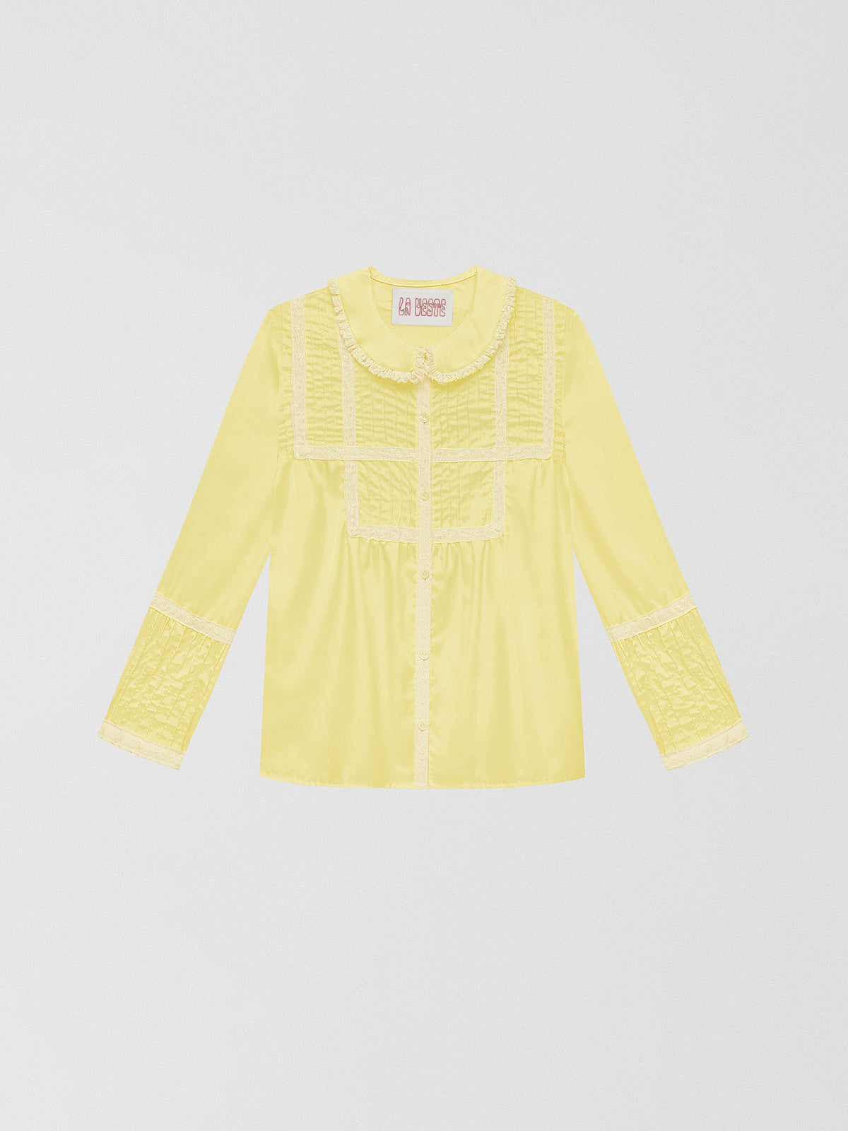 Yellow shirt with geometric lace pattern and pleated details