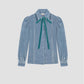 Sky blue velvet shirt with brown bow on the collar