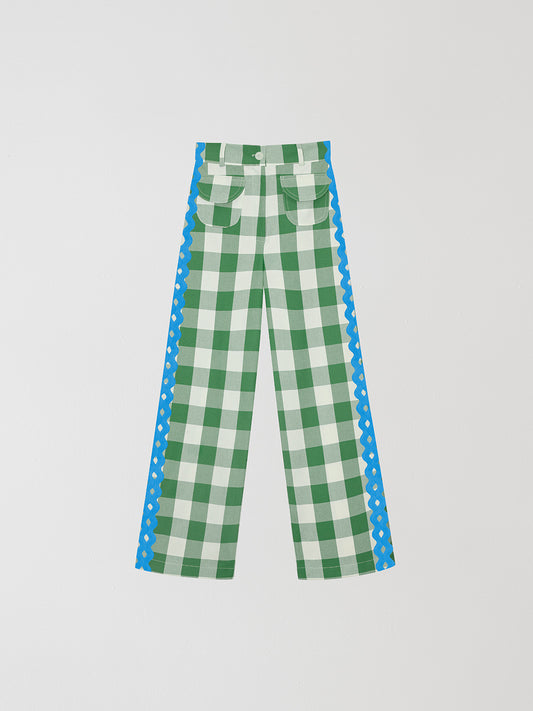 Cotton trousers with green and white check print and blue trim detail on the sides. 