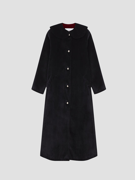 Long coat made in black velvet with baby collar and golden buttons
