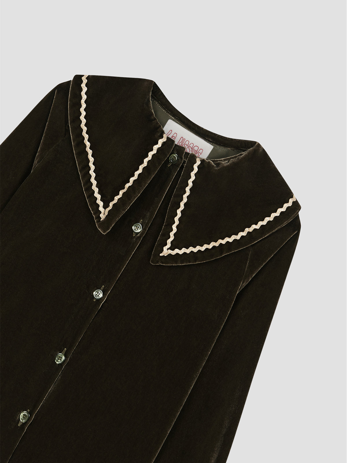 Green velvet shirt with large collar and trim detail