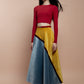 Flared midi skirt made in velvet with asymmetric pattern in light blue and yellow. 
